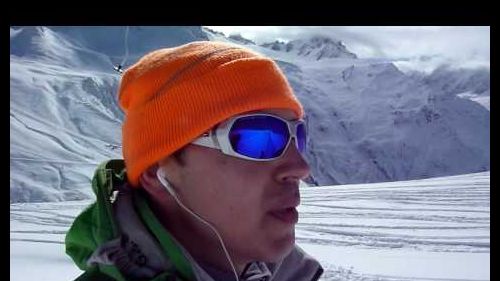 Going up the drag-lift, sunny weather and good snow are ideal for skiing HD